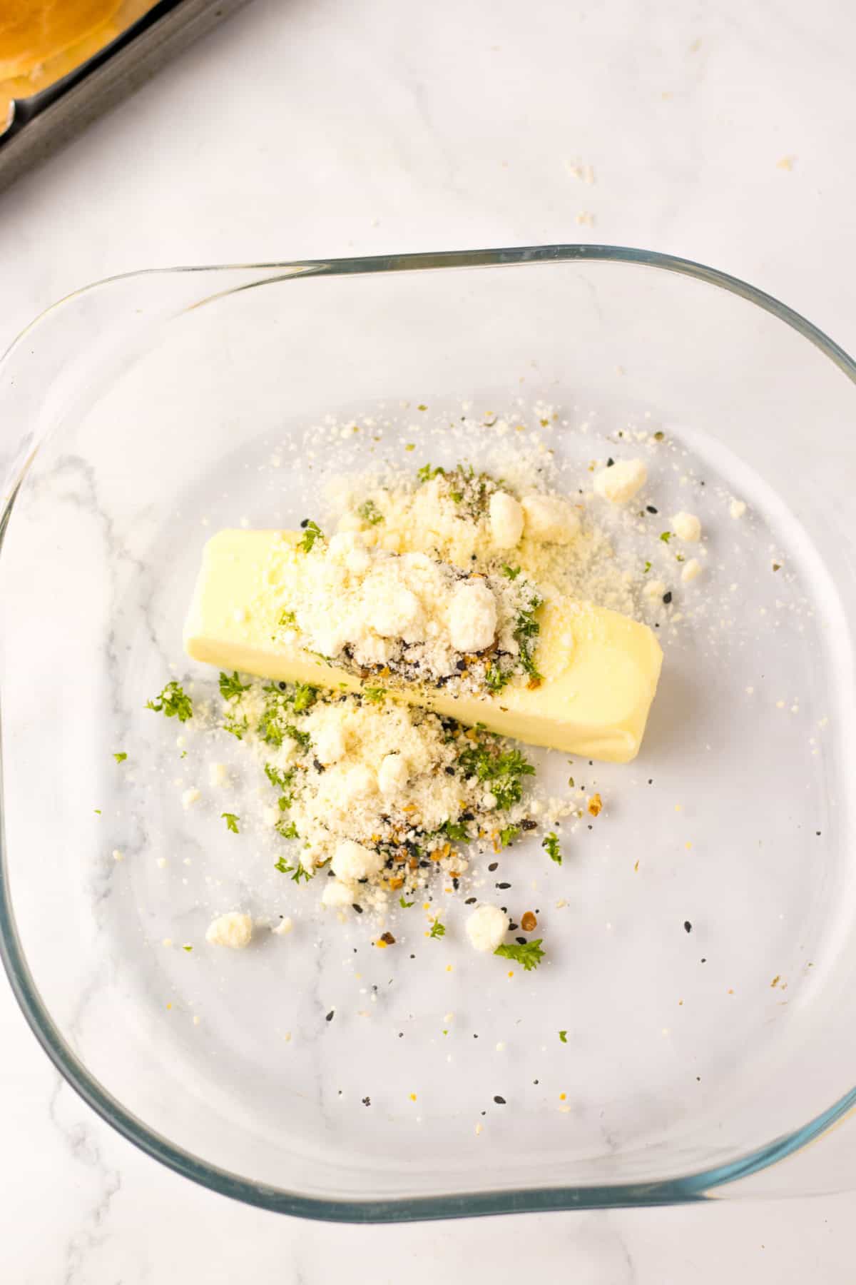 butter and seasonings in bowl