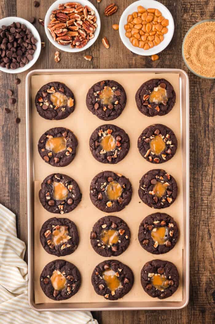 Cookie dough topped with caramels and pecans