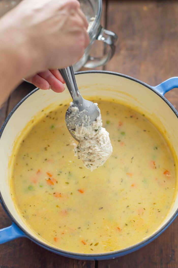 Dropping Bisquick dumplings into soup