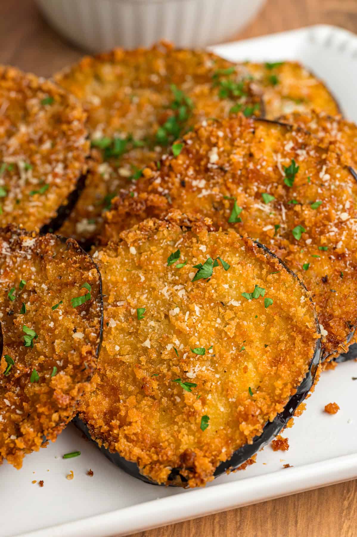 Fried eggplant on a white plate