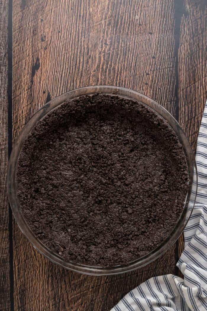 Oreo crust in a pie dish