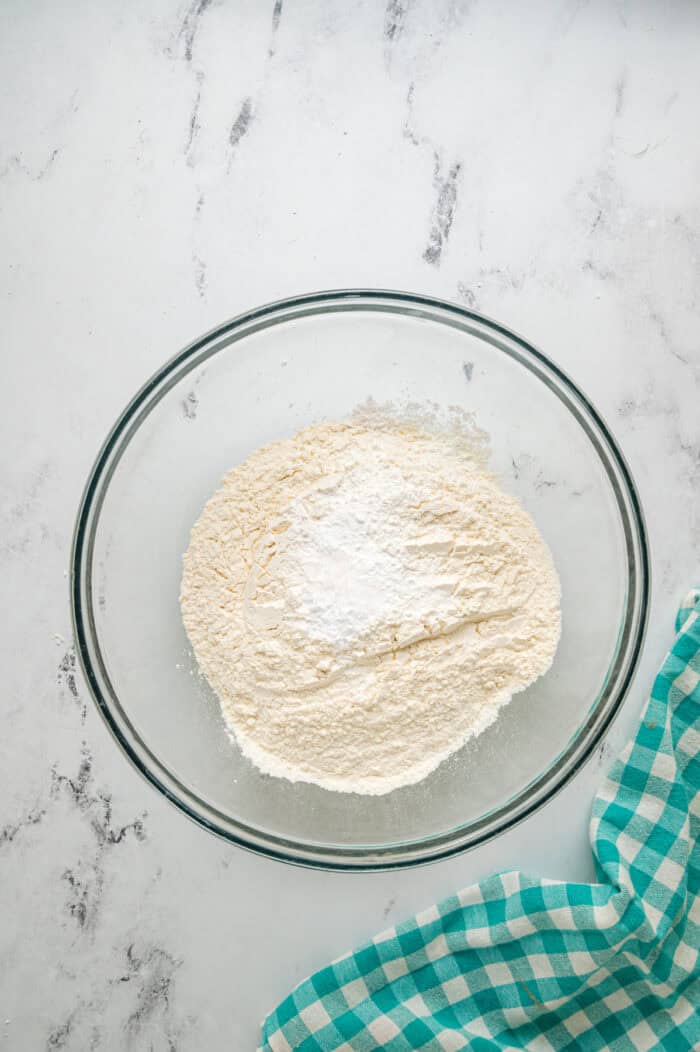 Dry cookie dough ingredients in a bowl