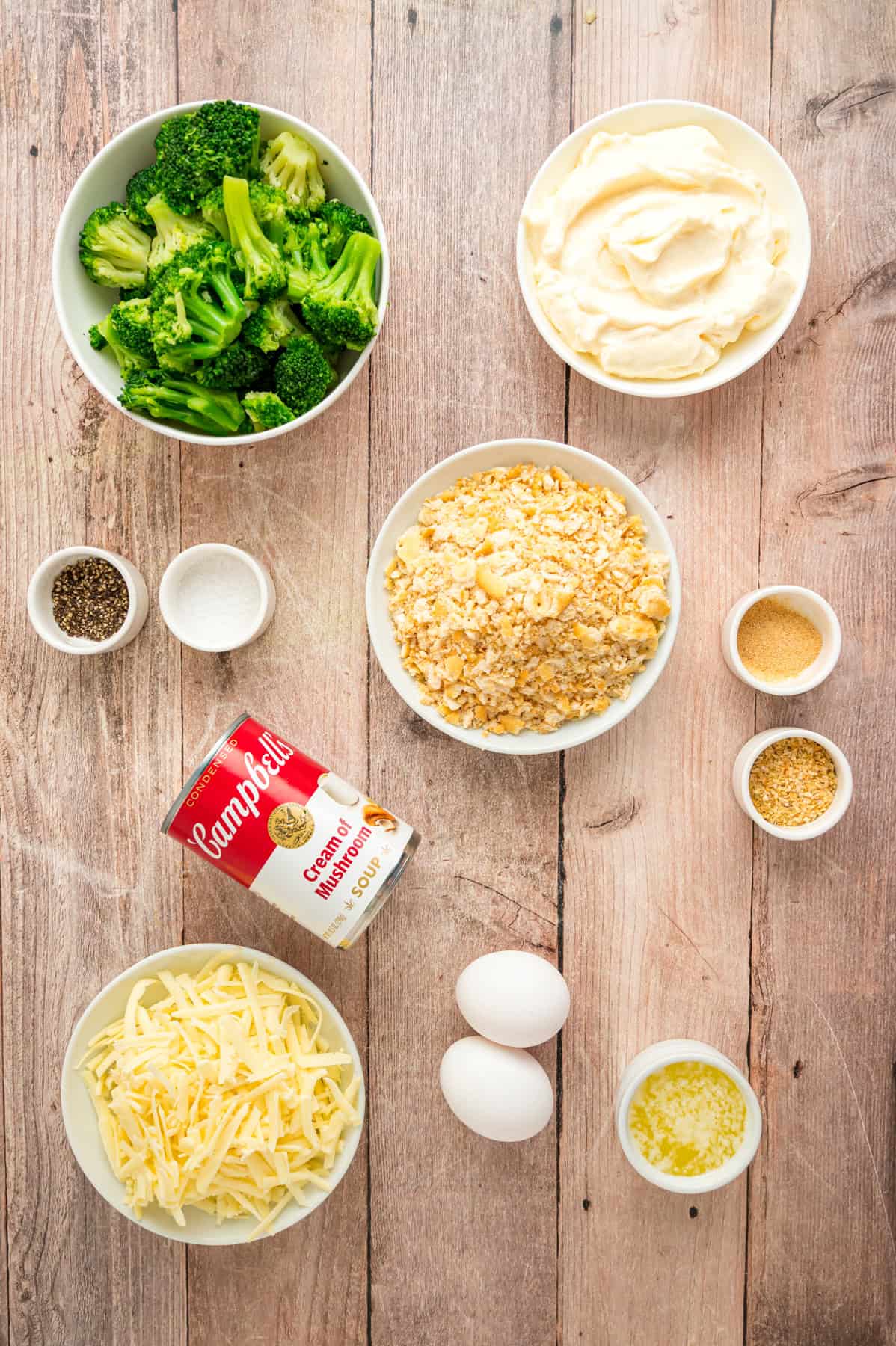 Overhead view of ingredients needed to make broccoli cheese casserole