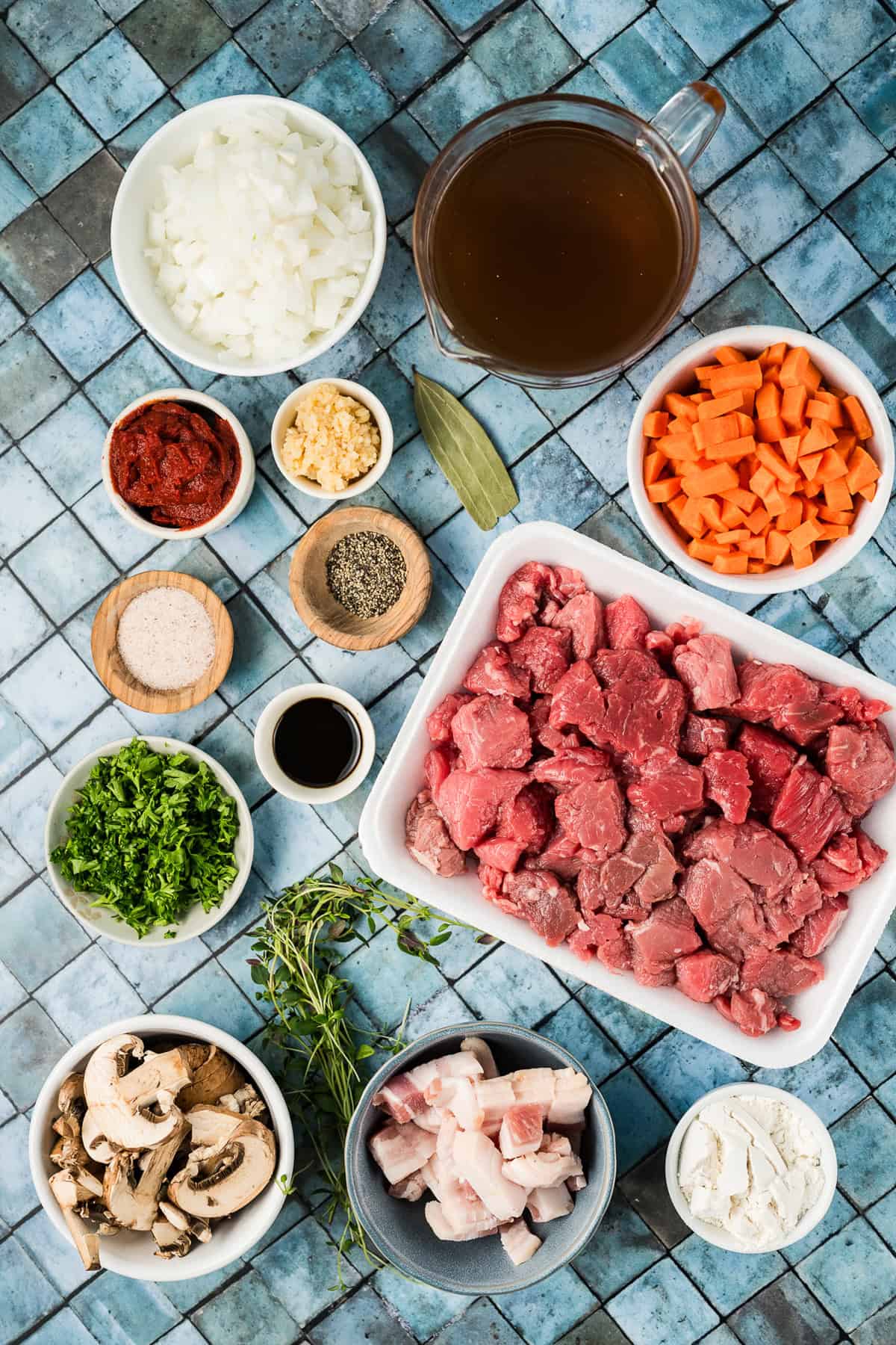Overhead view of beef and mushroom stew ingredients