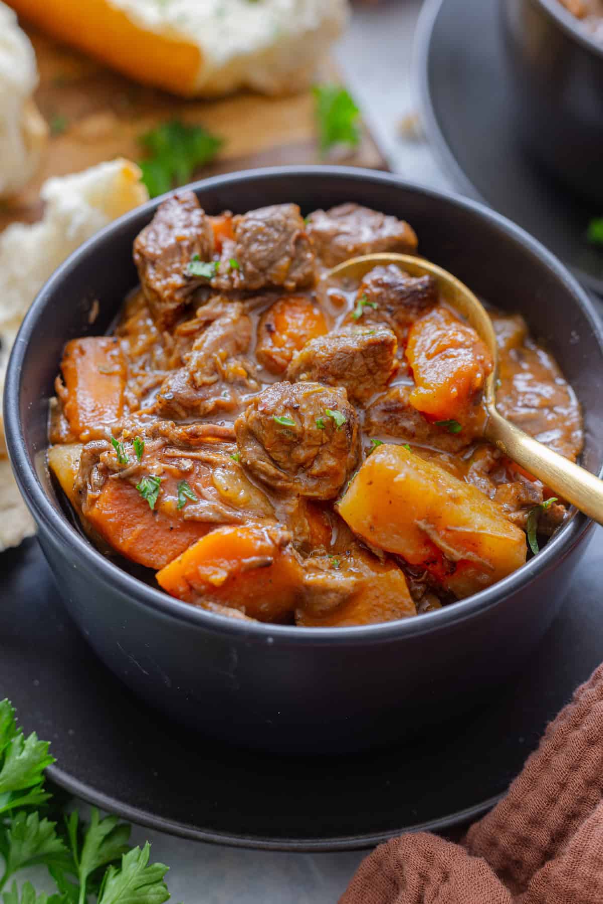 bowl with Slow Cooker Beef Stew and white bread