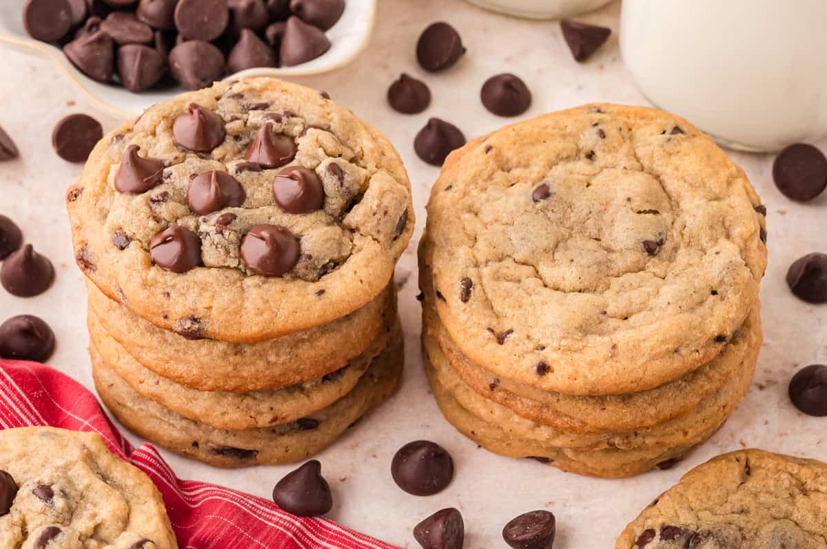 A stack of improved Toll House chocolate chip cookies next to the originals