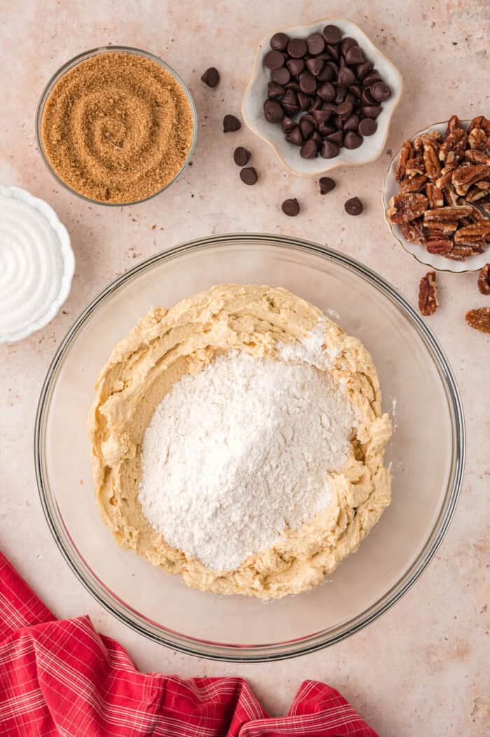 Dry ingredients added to wet cookie dough ingredients