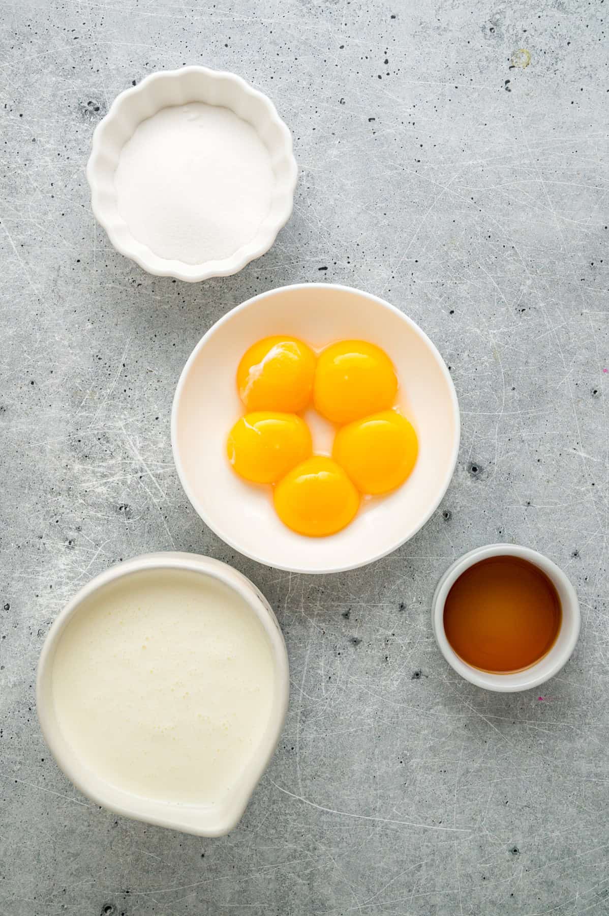 Overhead view of ingredients needed to make creme brulee