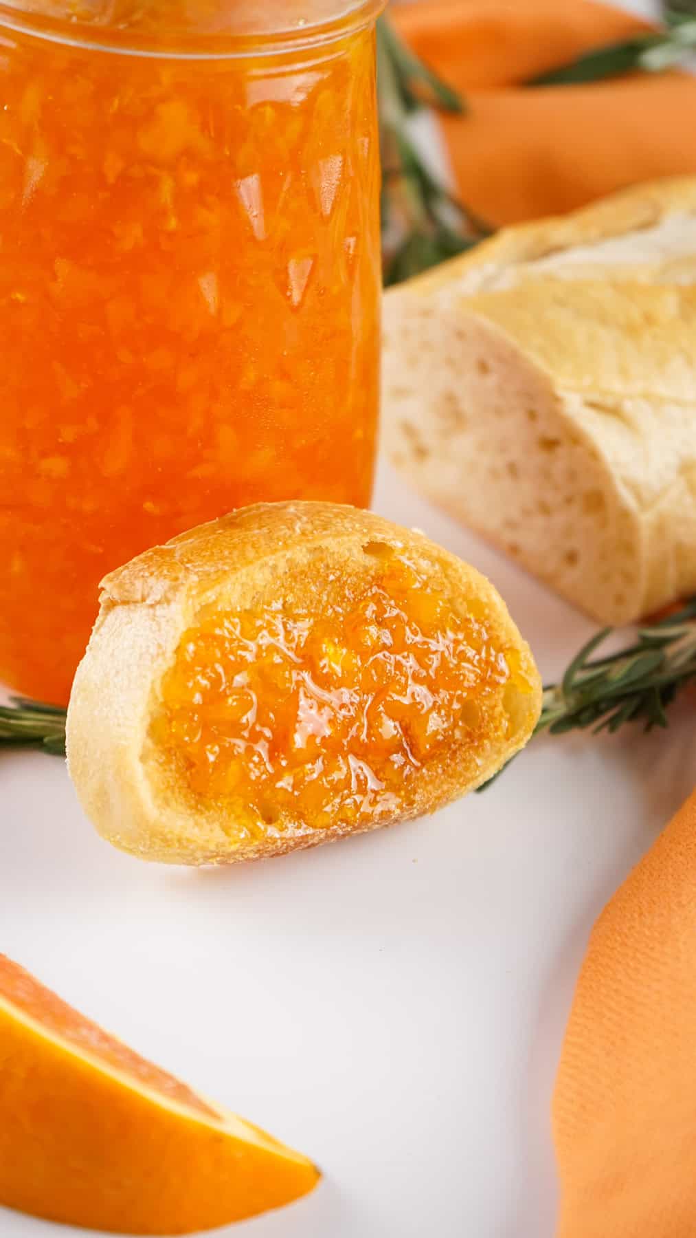 Orange marmalade on a baguette slice