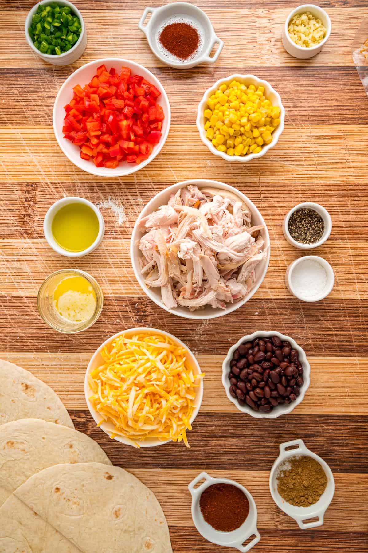 Overhead view of ingredients needed to make sheet pan quesadillas