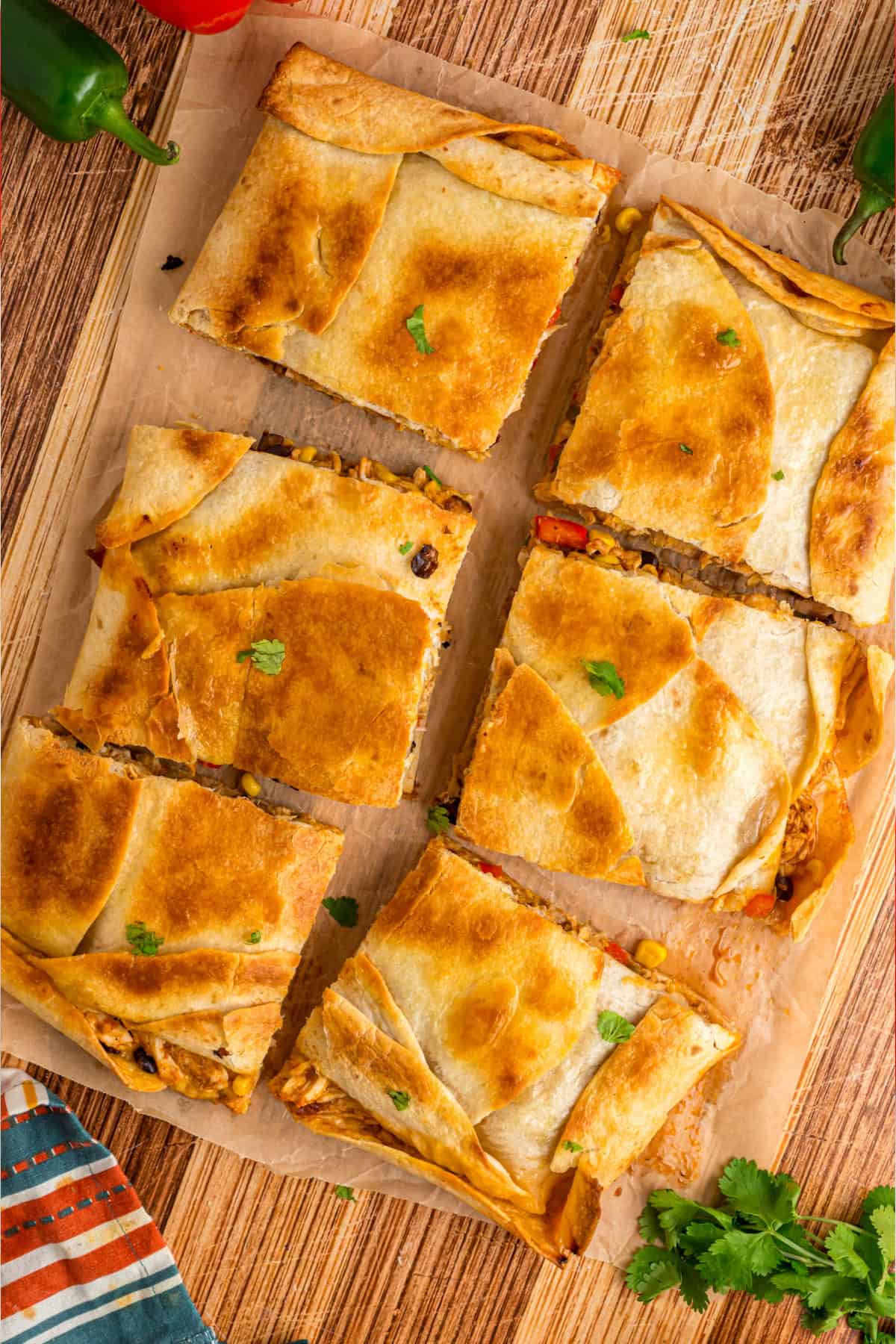 With rotisserie chicken, corn, black beans, and peppers, these Sheet Pan Quesadillas are packed with incredible Tex-Mex flavor. Sheet Pan Quesadillas
