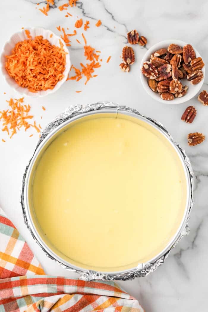 A baked cheesecake in a springform pan