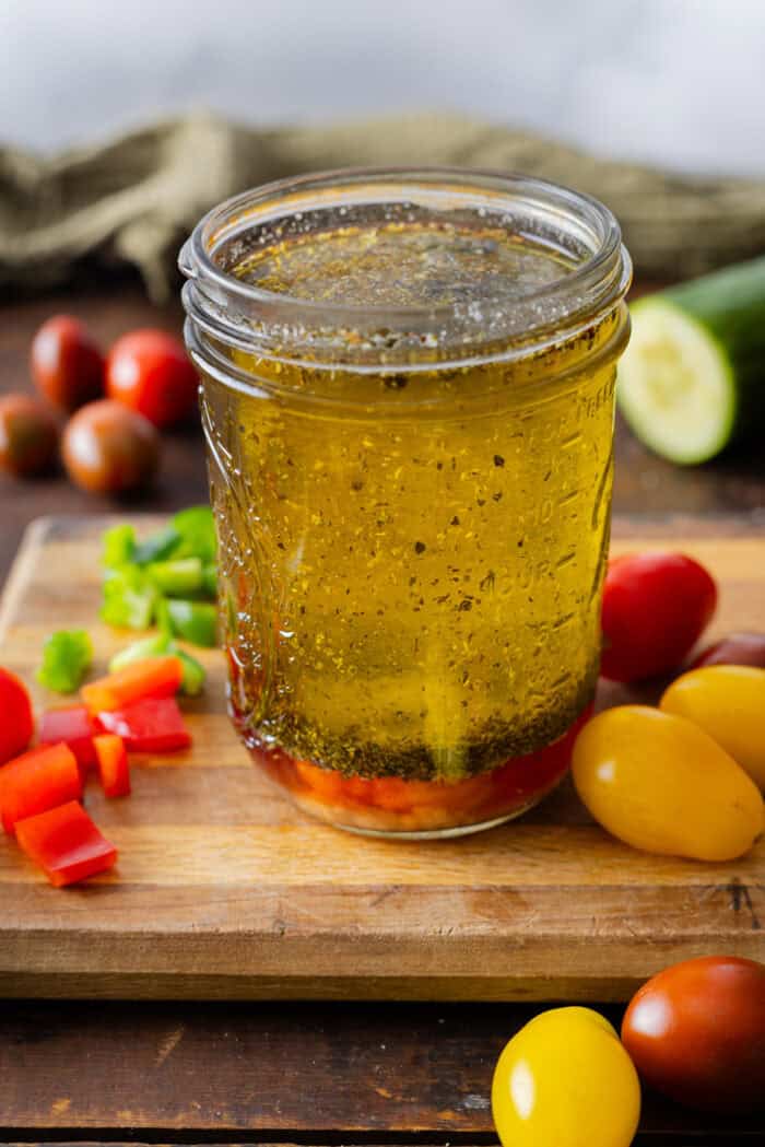 A jar of homemade Italian dressing