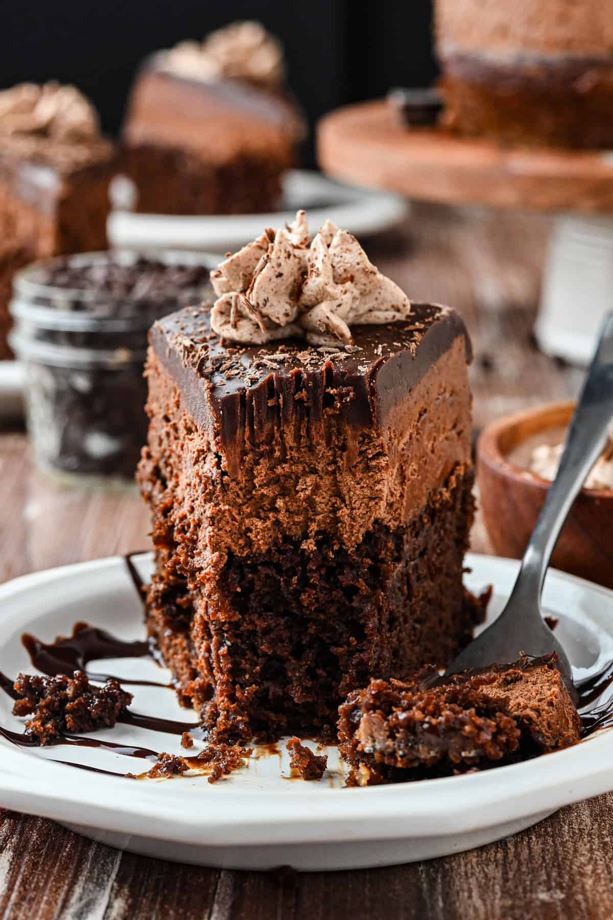 A slice of chocolate mousse cake on a plate