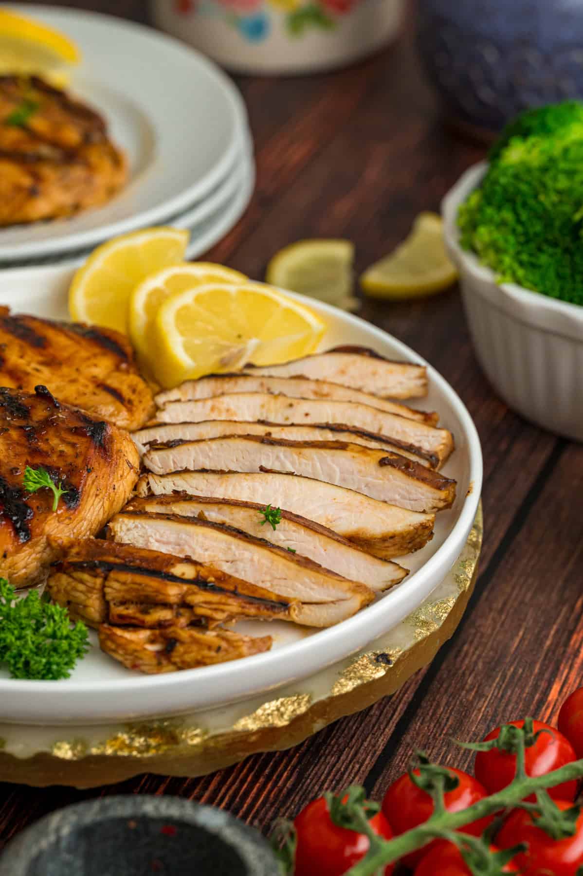 A plate of grilled chicken breasts