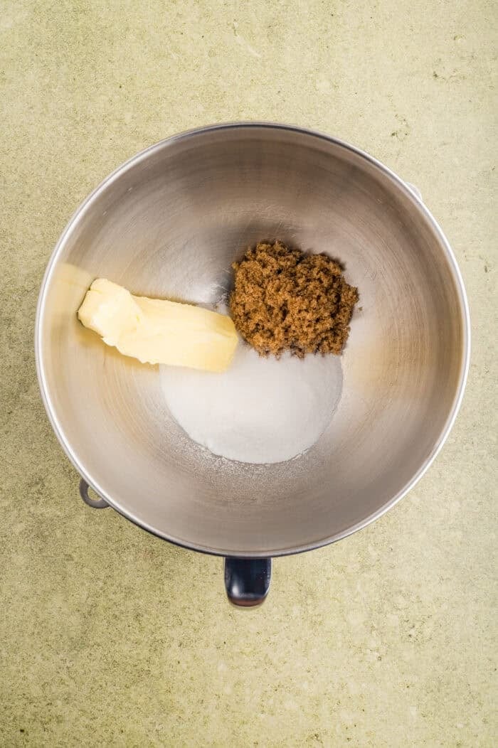 Sugar and butter in a mixing bowl