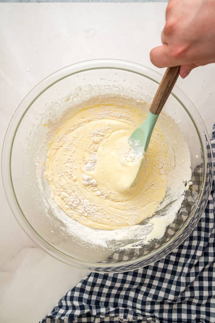 Folding dry ingredients into cake batter