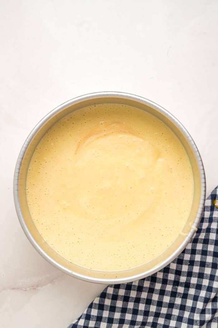 Cake batter in a round pan