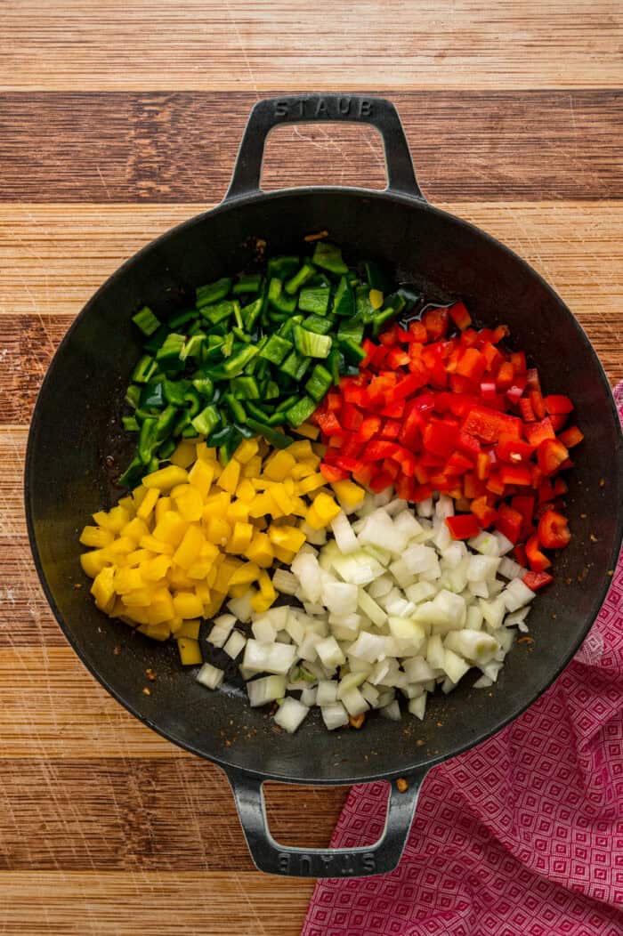 Bell peppers and onions in a skillet