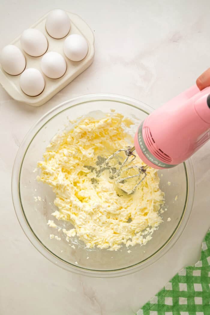 Ultra moist and dense with a tender crumb, this Cream Cheese Pound Cake offers a rich buttery vanilla flavor. Creaming butter in a bowl