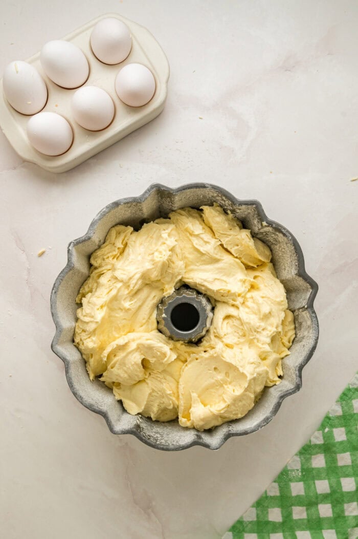 Ultra moist and dense with a tender crumb, this Cream Cheese Pound Cake offers a rich buttery vanilla flavor. Pound cake batter in a bundt pan