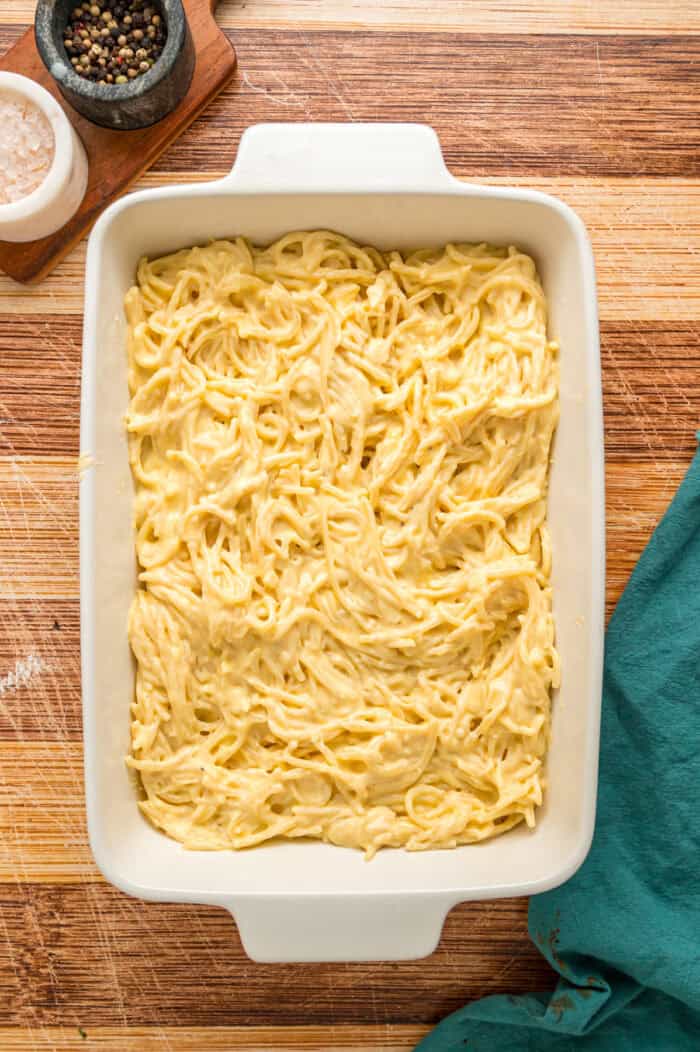 Spaghetti in a cheese sauce in a casserole dish