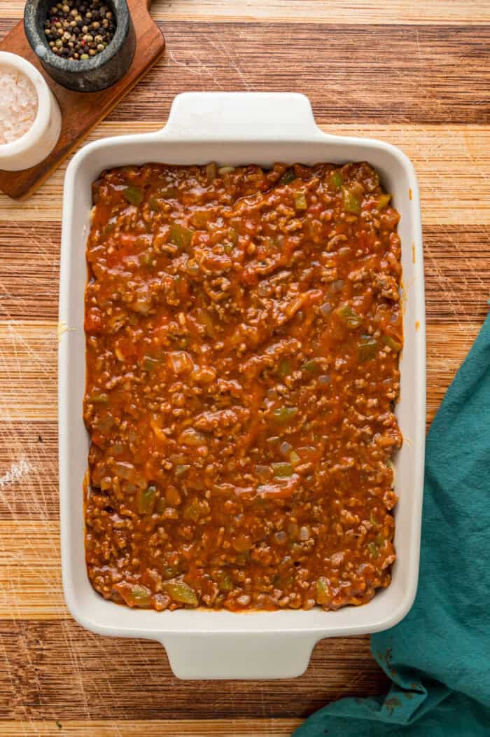 Meat sauce on top of cheesy spaghetti
