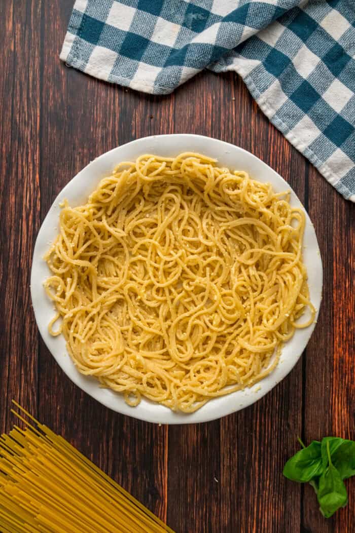 Spaghetti pressed into a pie pan as a crust