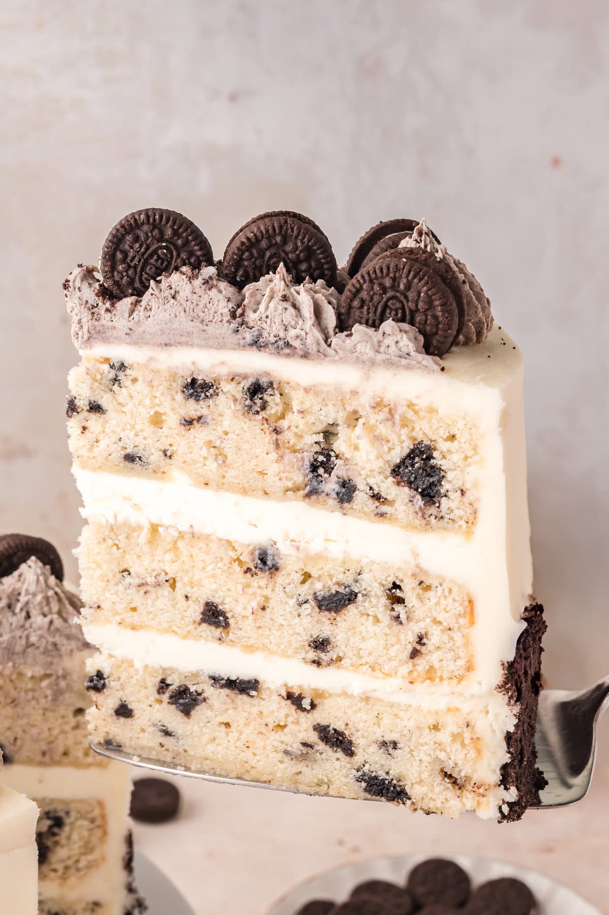 Serving a slice of Oreo Cake