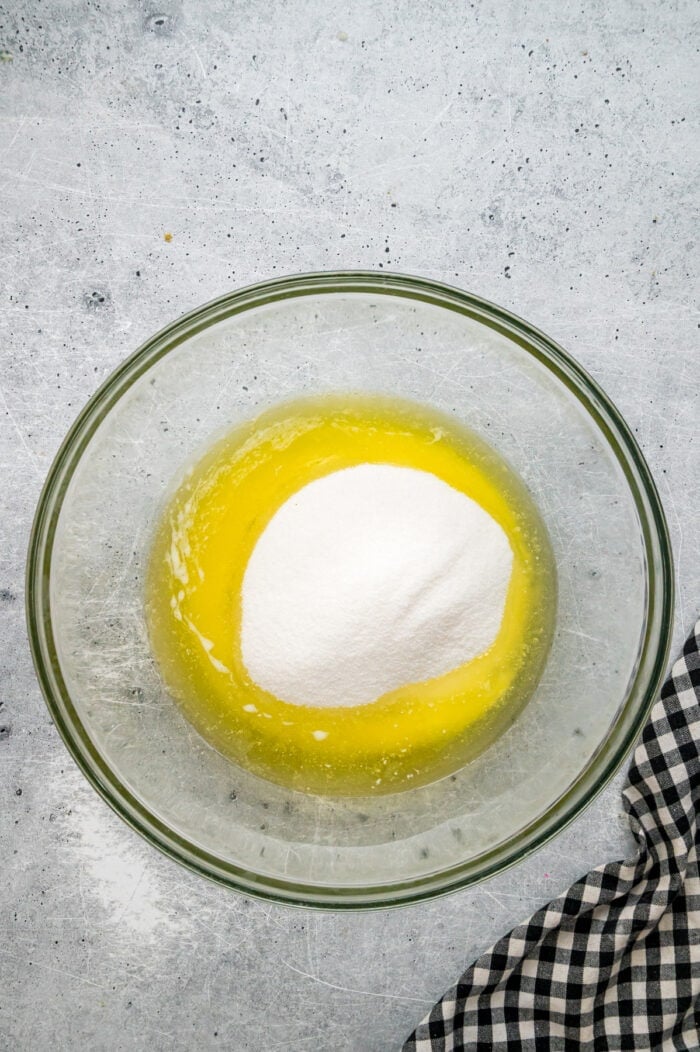 Melted butter, oil, and sugar in a bowl