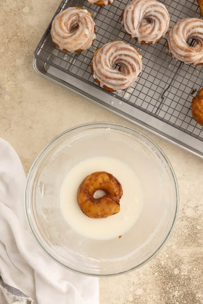French cruller donut dipped in vanilla glaze