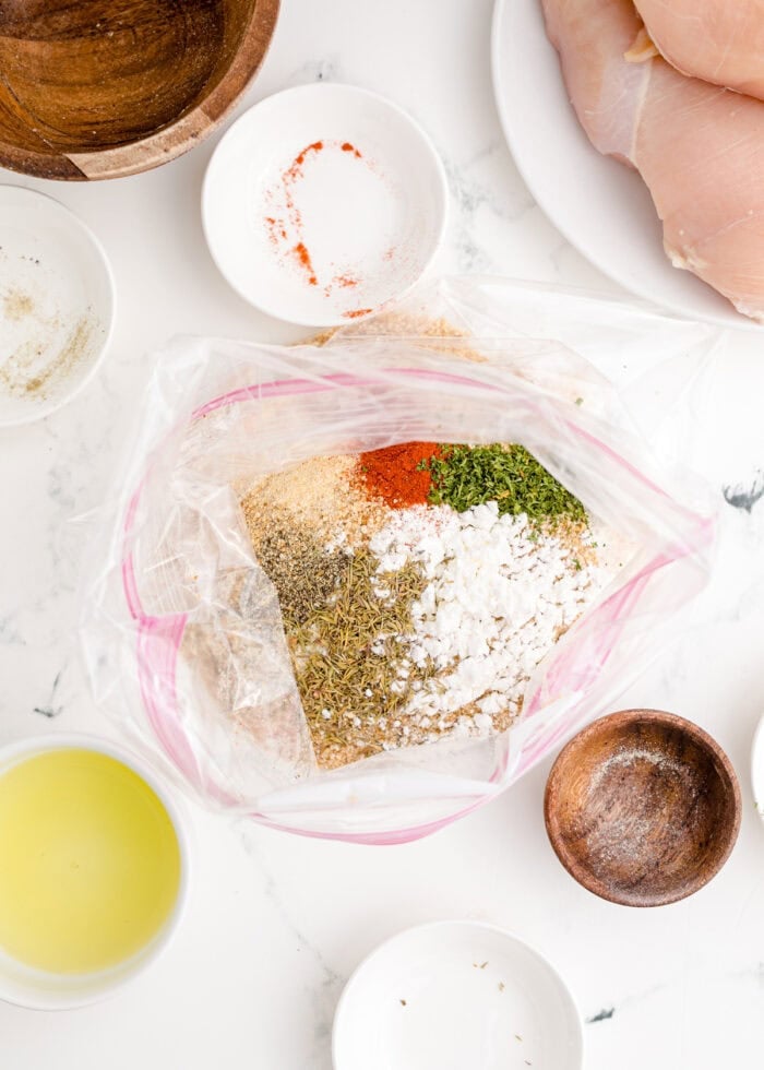 Breadcrumbs and seasonings in a ziploc bag
