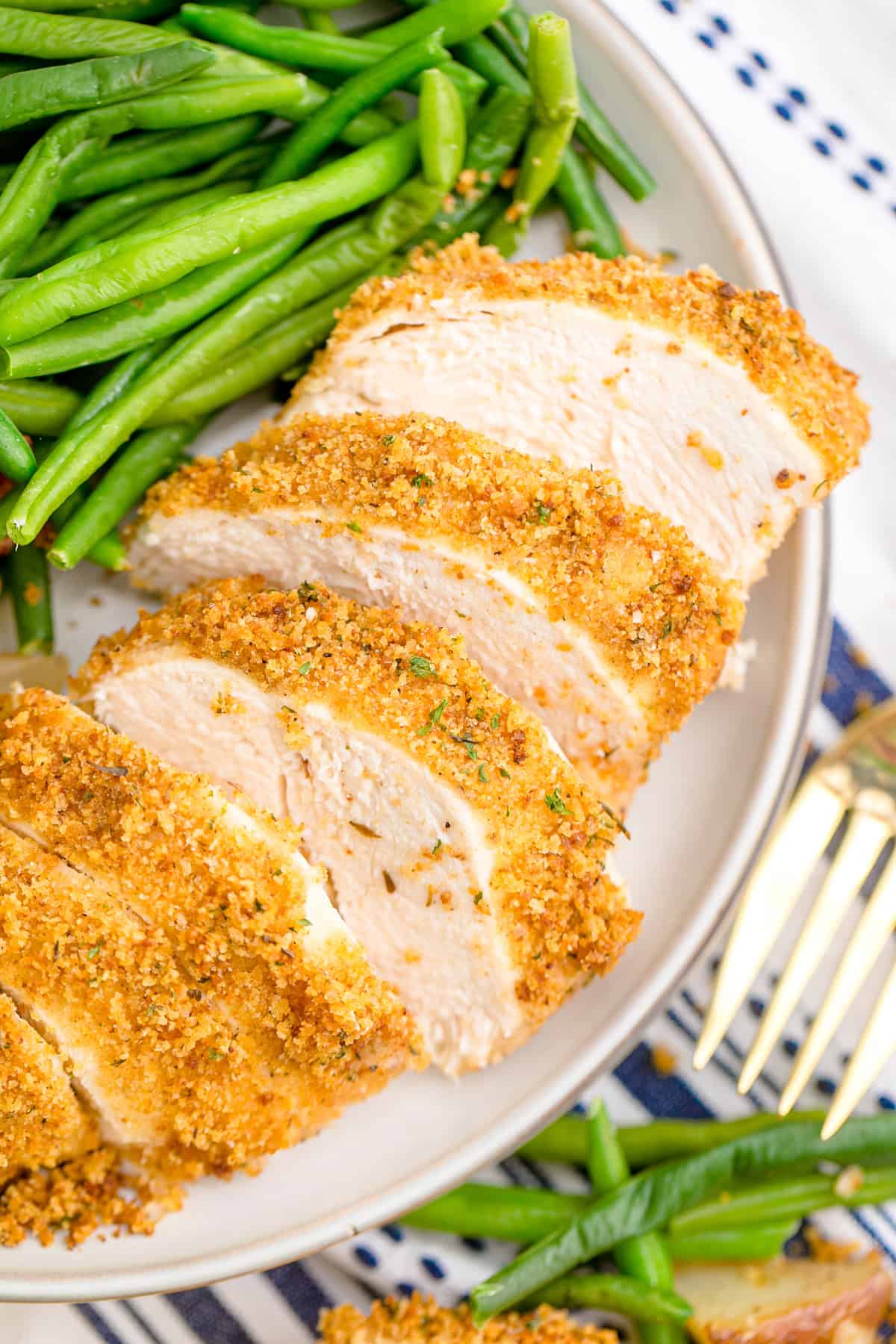 Close up of sliced shake and bake chicken