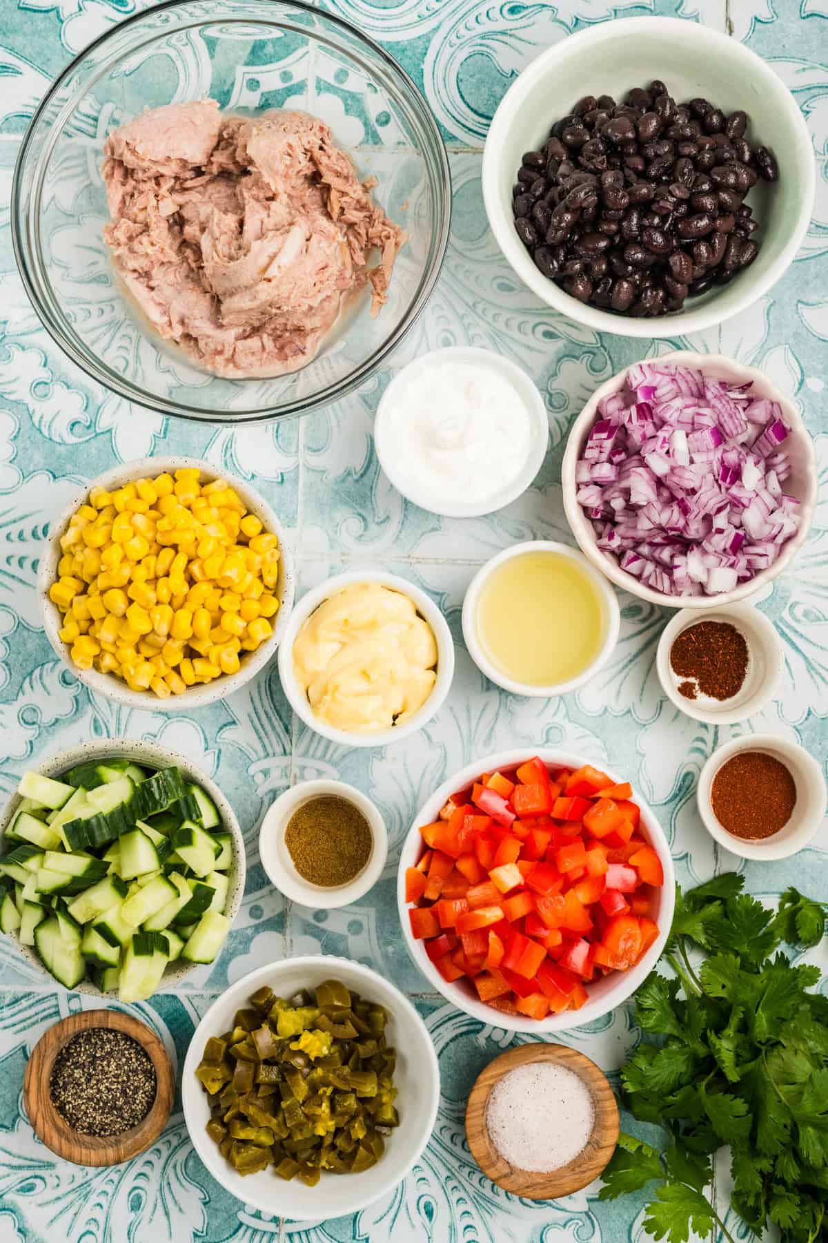 Overhead view of ingredients needed to make Mexican tuna salad