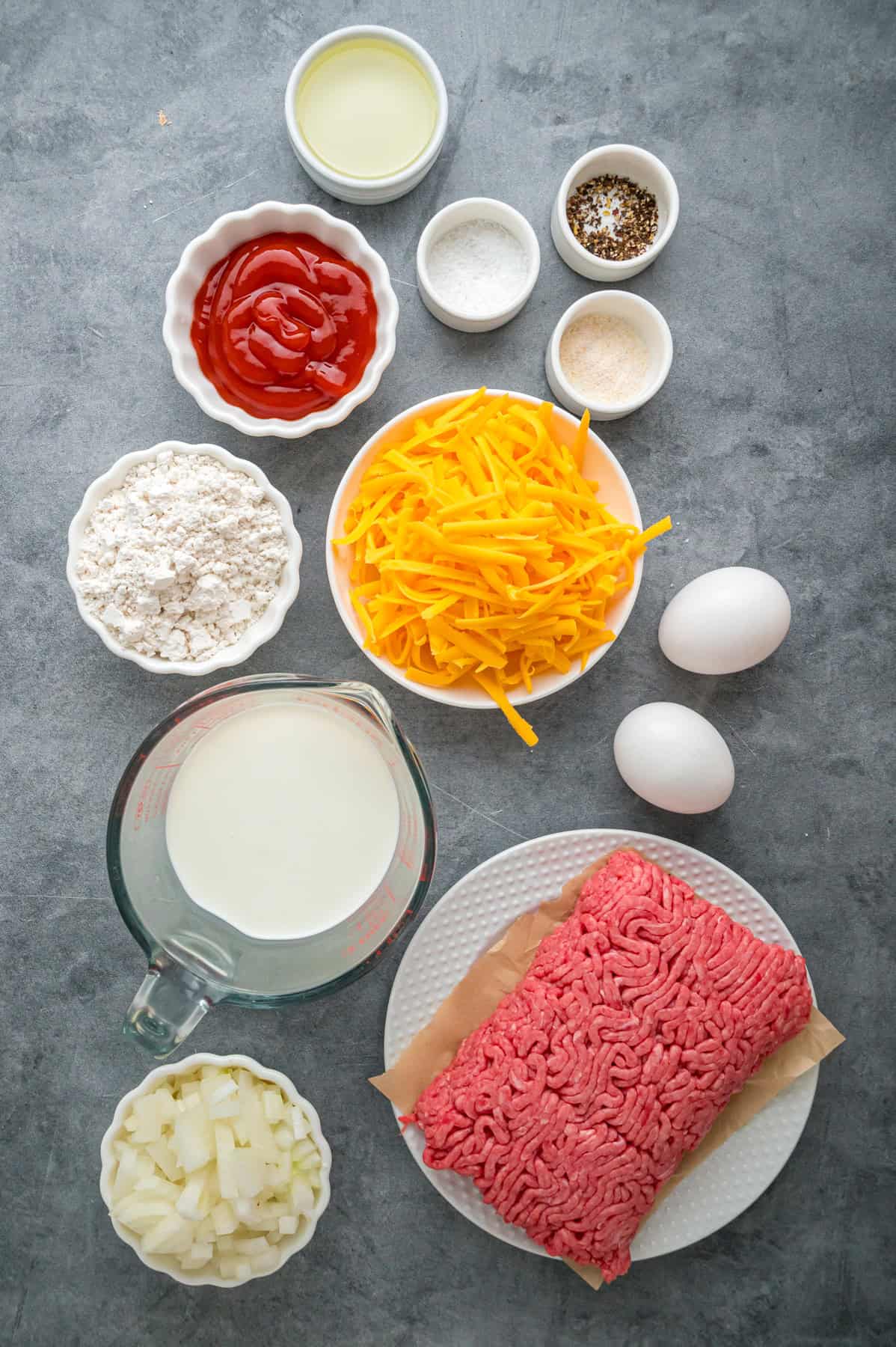 Overhead view of ingredients needed to make cheeseburger pie