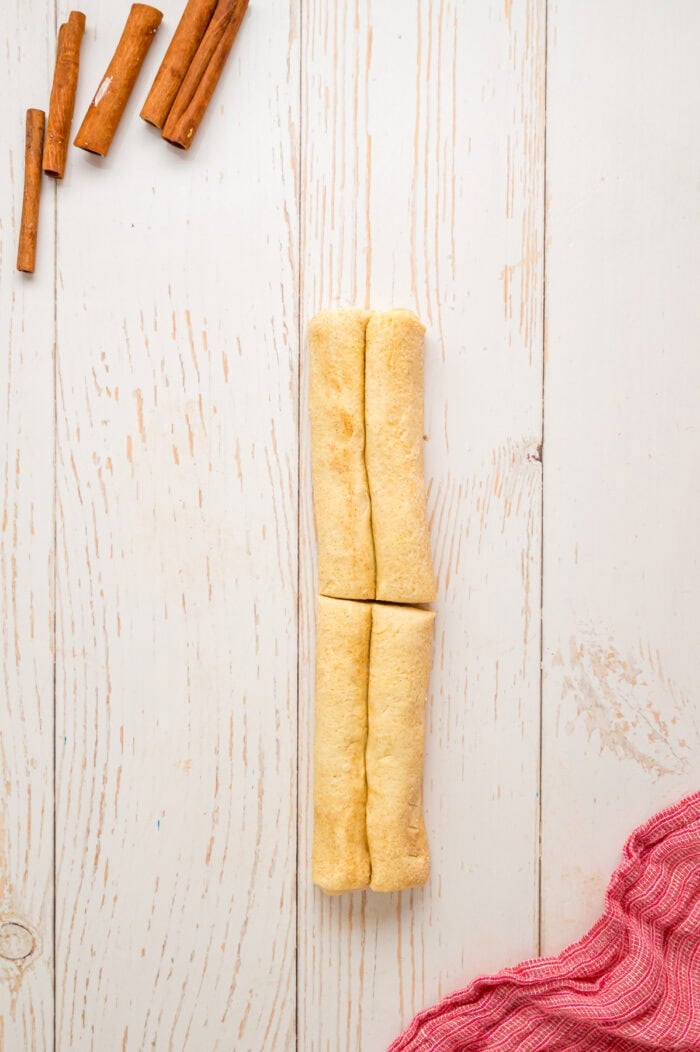 Two puff pastry logs cut in half