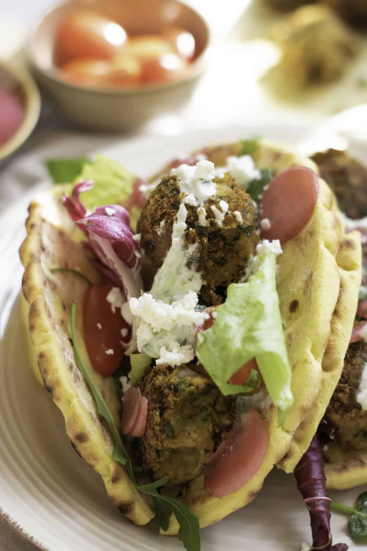 Close up of a falafel wrap