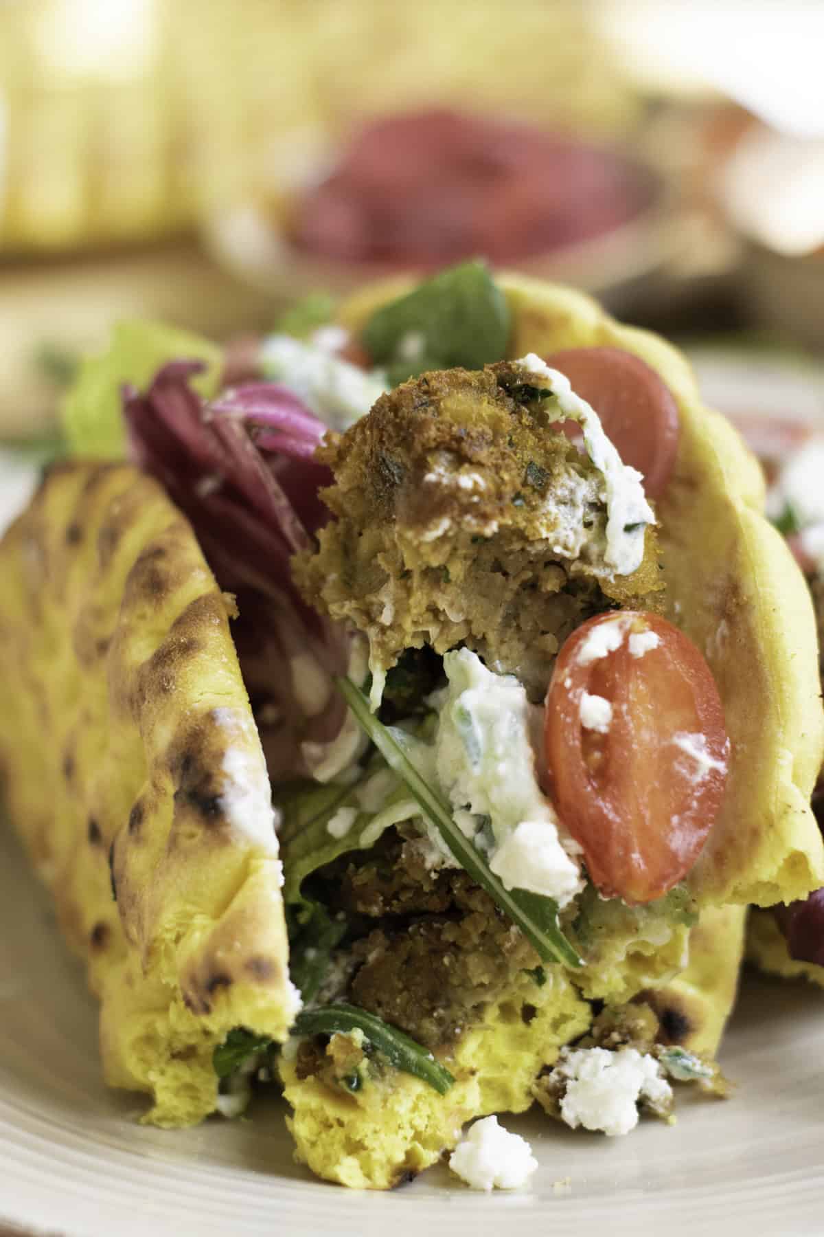 Close up of a falafel wrap