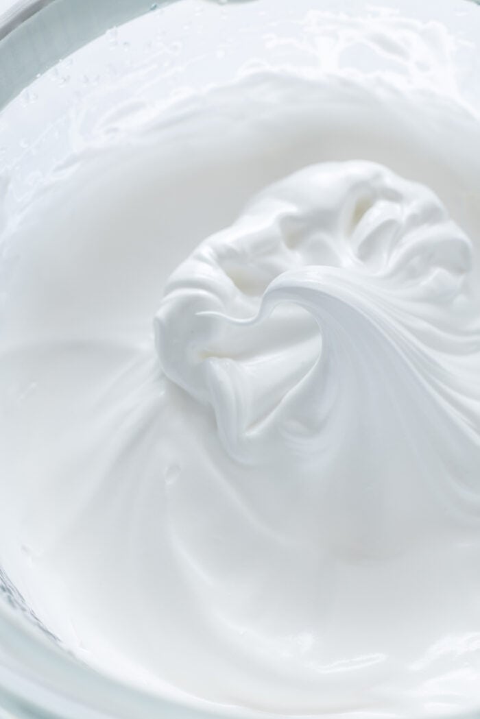 Stiff peaks in a mixing bowl of Italian buttercream