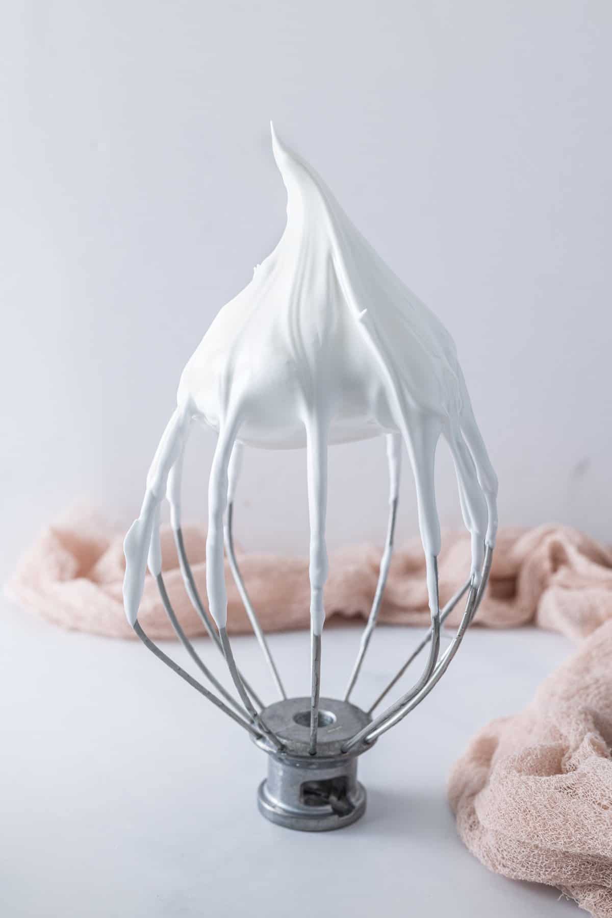 Italian meringue buttercream on a whisk attachment