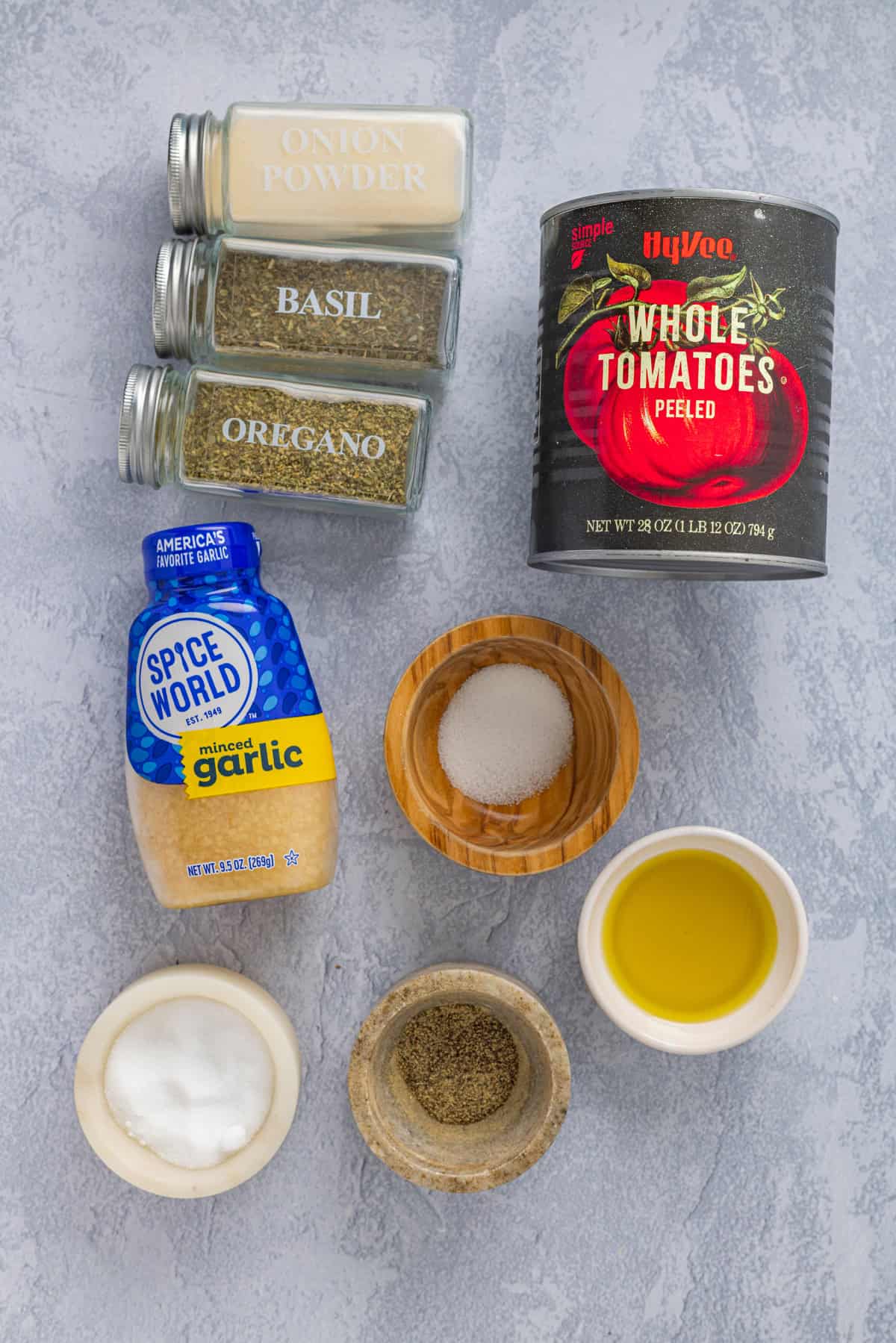 Overhead view of ingredients needed to make pomodoro sauce