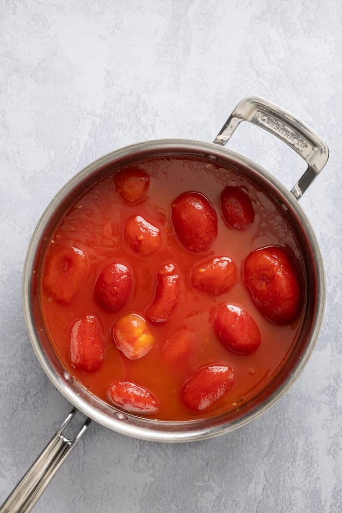 Roma tomatoes in a pan
