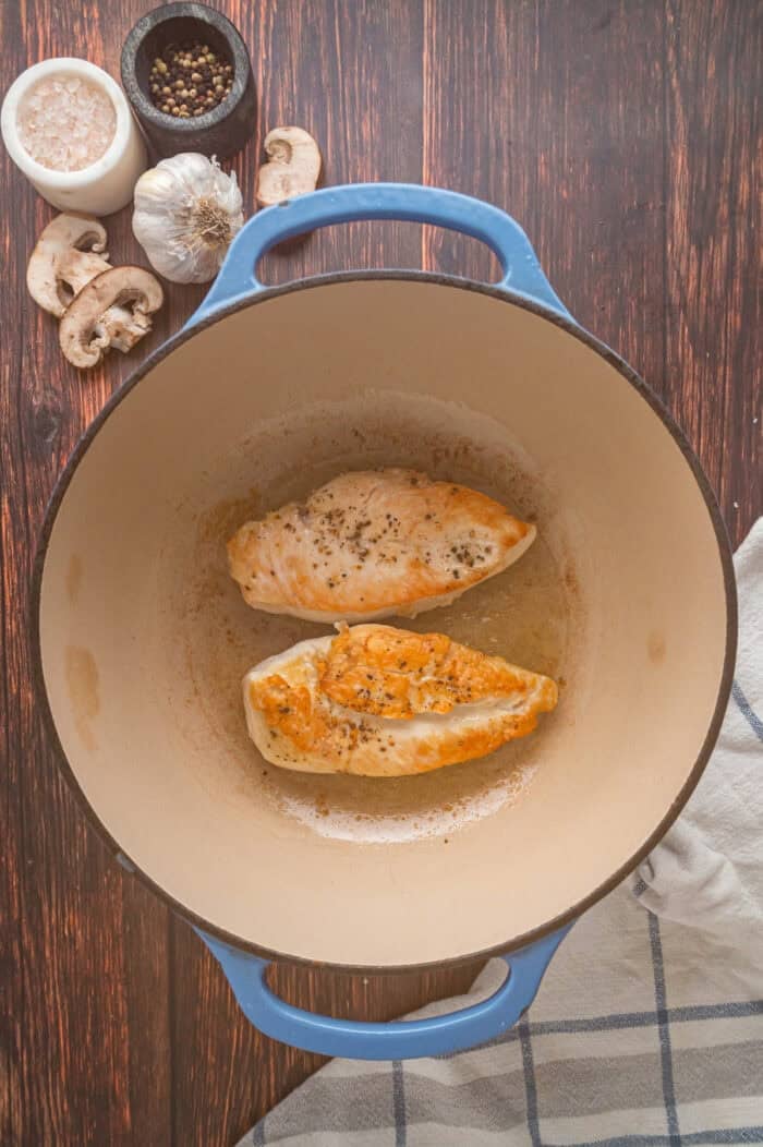 Cooked chicken breast in a pan