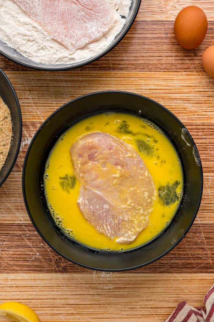 A chicken cutlet dipped in egg