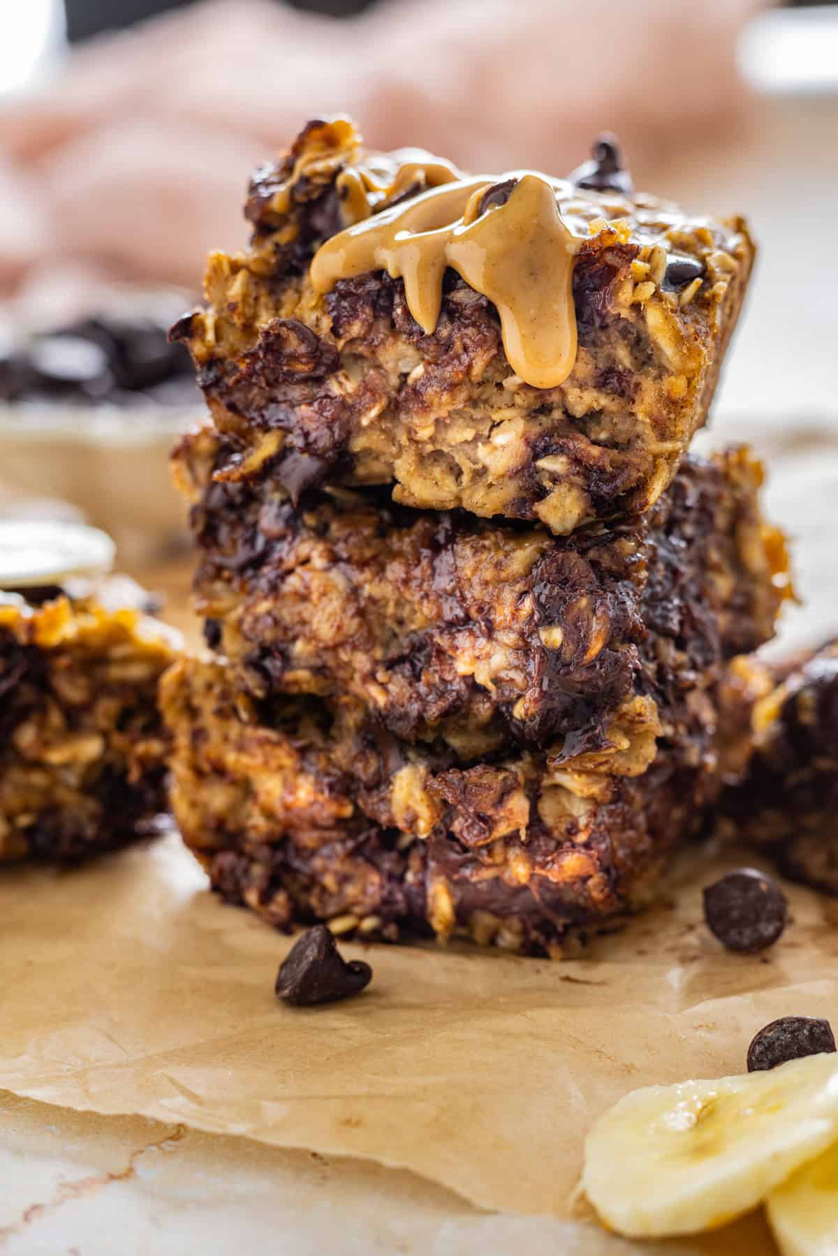 Three slices of baked banana oatmeal stacked on each other
