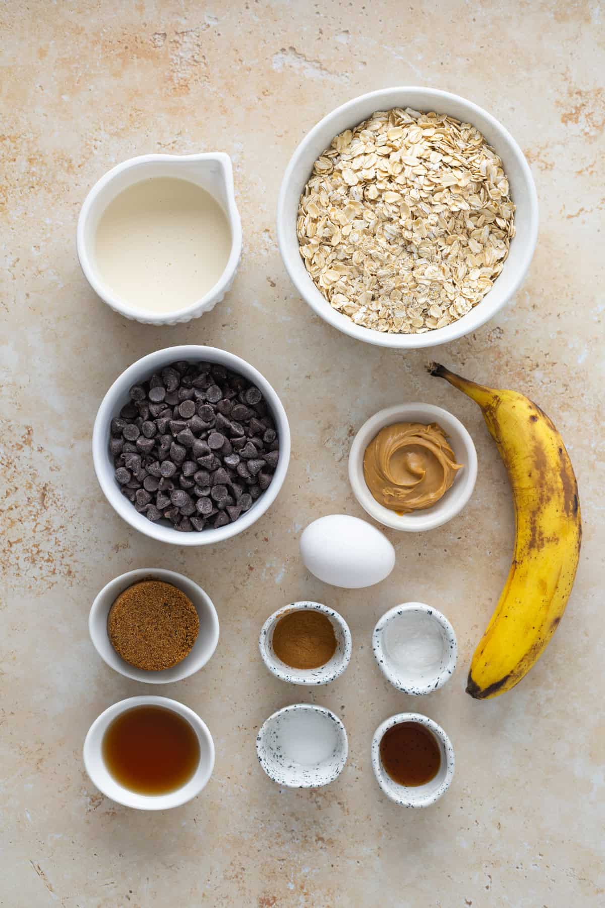 Overhead view of ingredients needed to make banana baked oatmeal