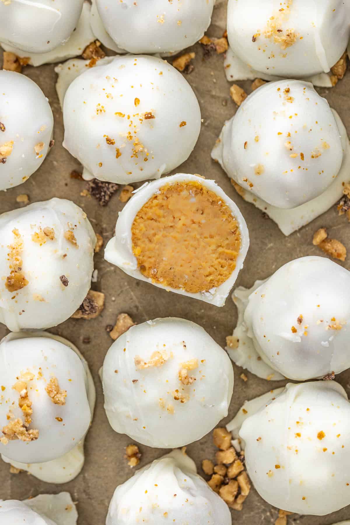 Overhead view of pumpkin truffles, one open to show the inside