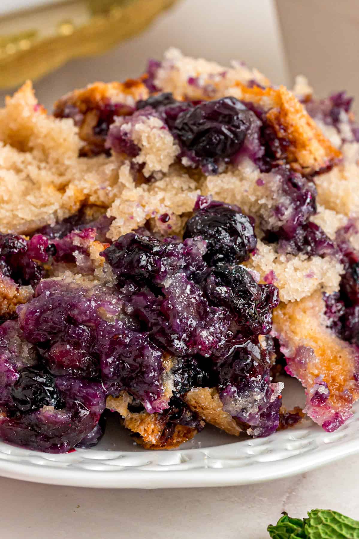 A serving of blueberry cobbler on a plate
