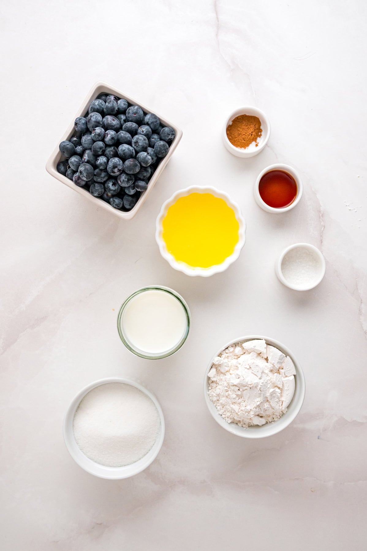 Overhead view of ingredients needed to make blueberry cobbler