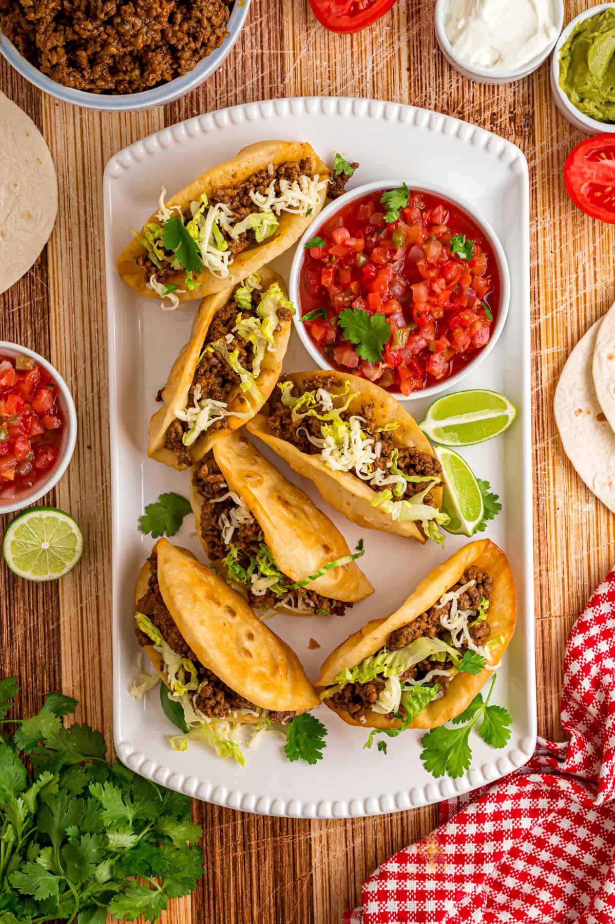 Overhead view of a platter of ground beef tacos